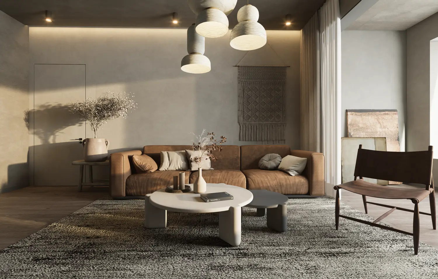 Wohnzimmer mit zurückhaltender Farbpalette und unterschiedlichen Sitzmöbeln